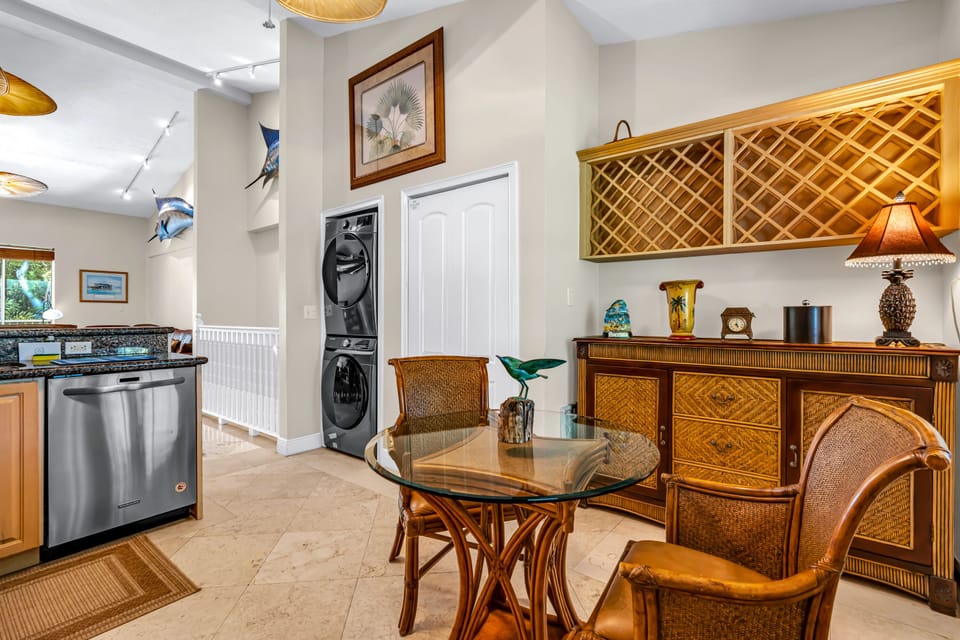 Large eat in kitchen with washer and dryer off to the side