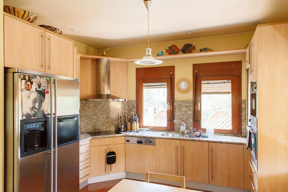 The modern kitchen of the house.
