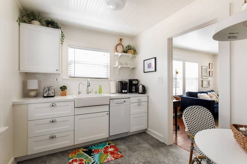 Remodeled sunny kitchen with reverse osmosis water filter for unlimited filtered water.   