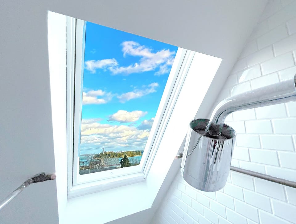Skylights flood the 2nd floor with sunlight. Shower with broad harbor views!