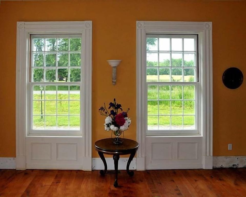 The Salon looks over a farmer's field.