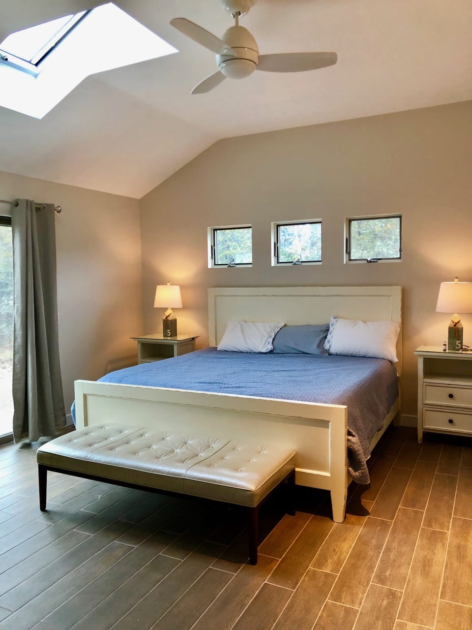 Primary bedroom with slider to back deck