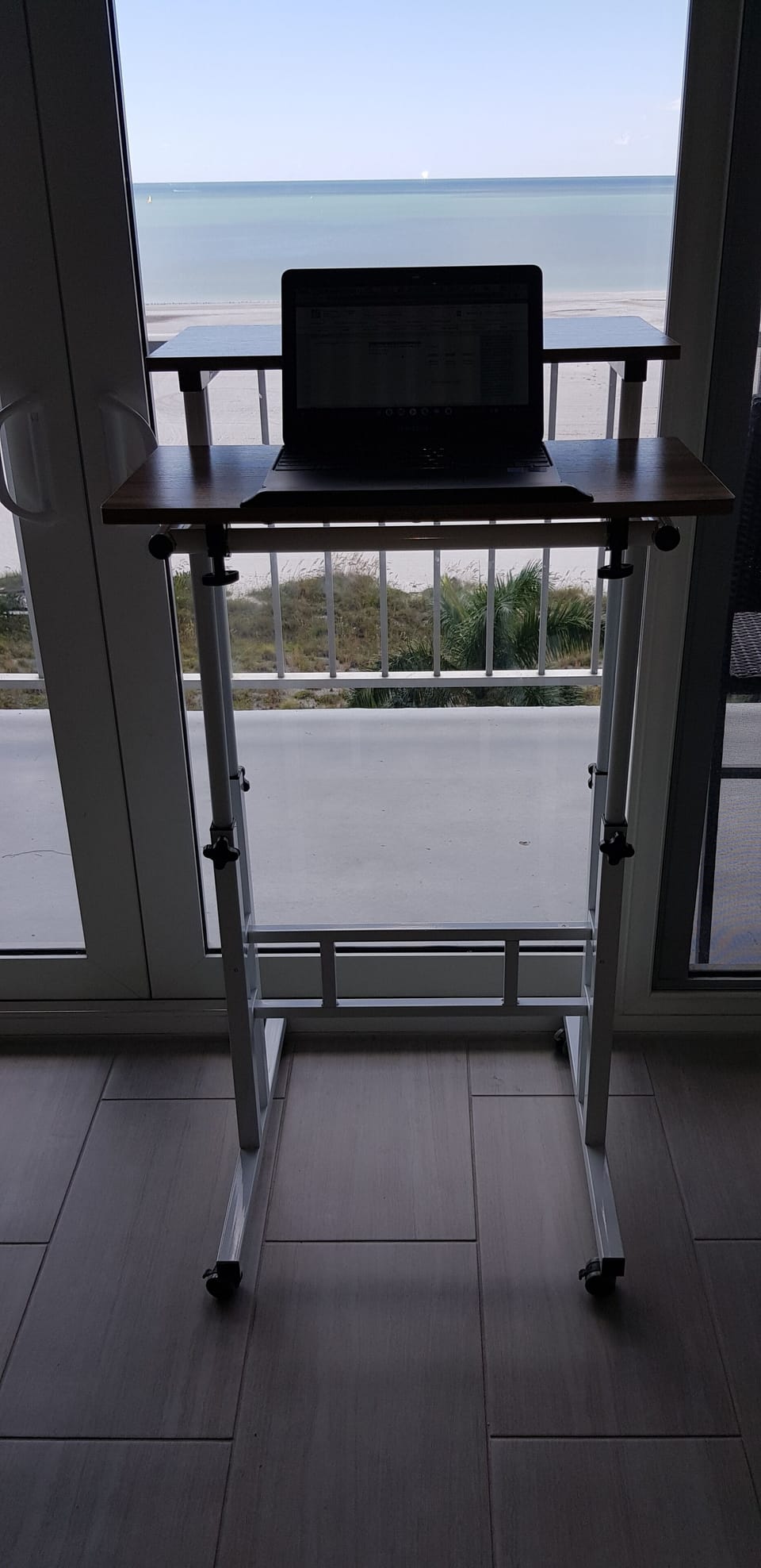 Available Adjustable (Standing or Sitting) Desk Creates an Office with a View
