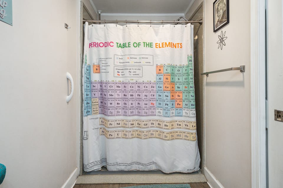 Walk in shower in the shared hallway bathroom.