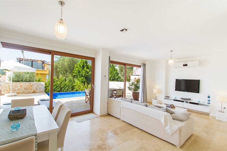 Open plan dining and sitting room. 