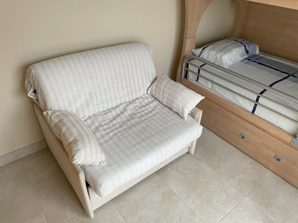 Single sofabed. Can be located in bedroom #2 or bedroom #3.