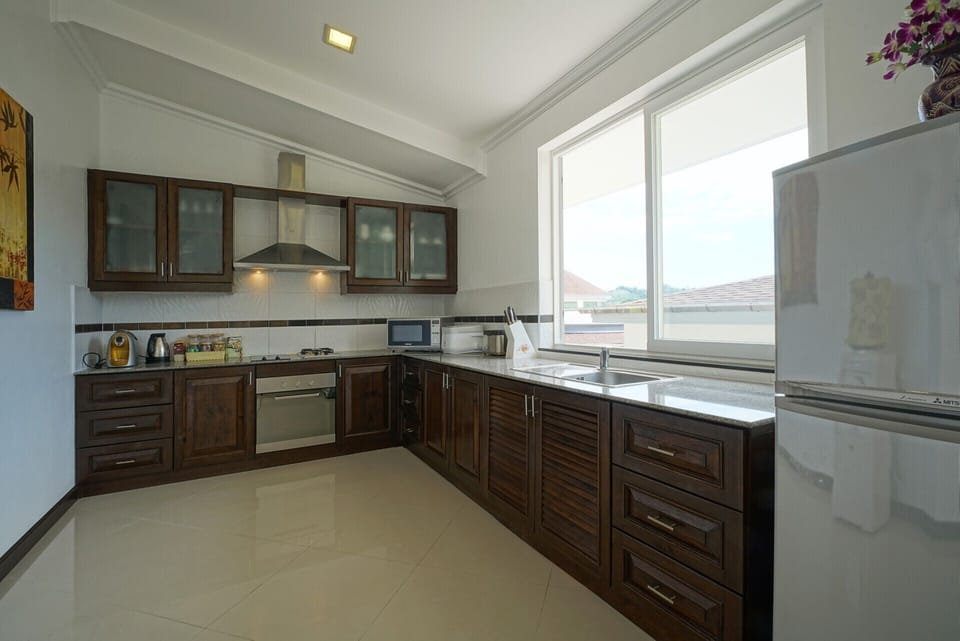 Fully equipped kitchen with complementary drinking water.