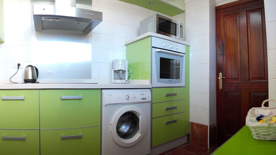 The kitchen - fully kitted and featuring all electrical appliances