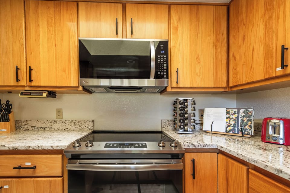Spacious kitchen w/ ample counter space & everything needed to cook comfortably