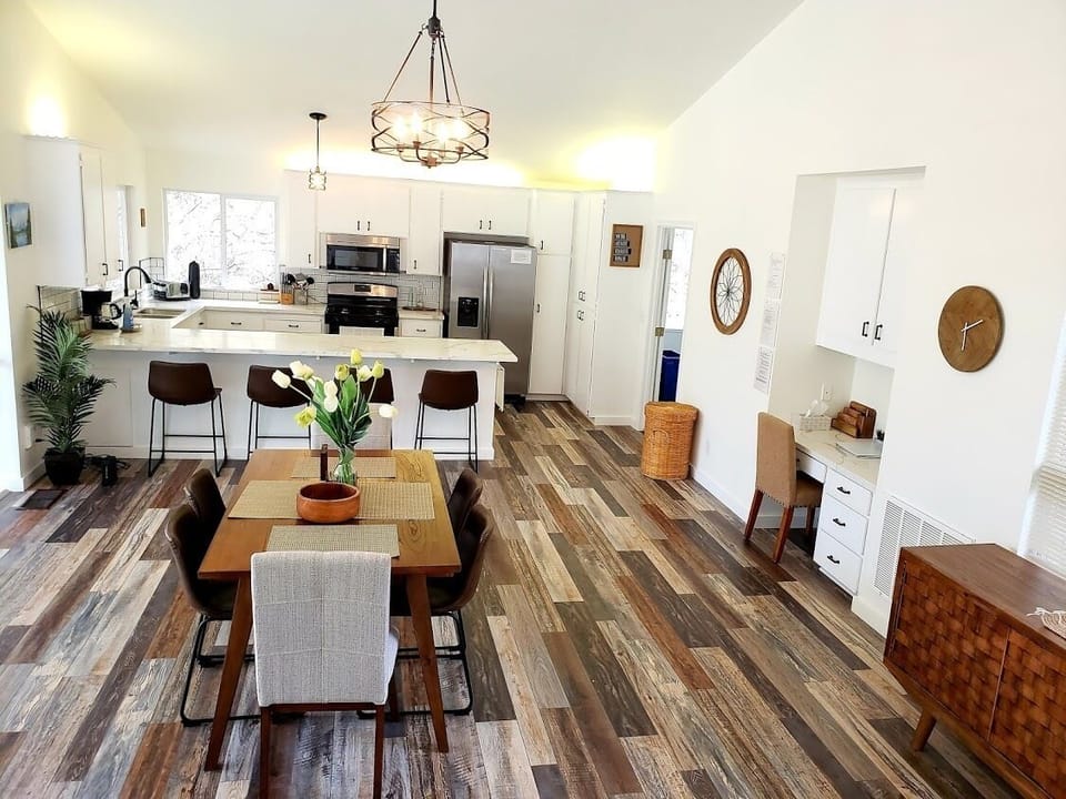 Dining room / Kitchen Area with all new furniture, new quartz counter tops.