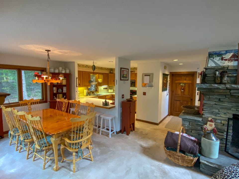 Open view from dining room and family room into the kitchen