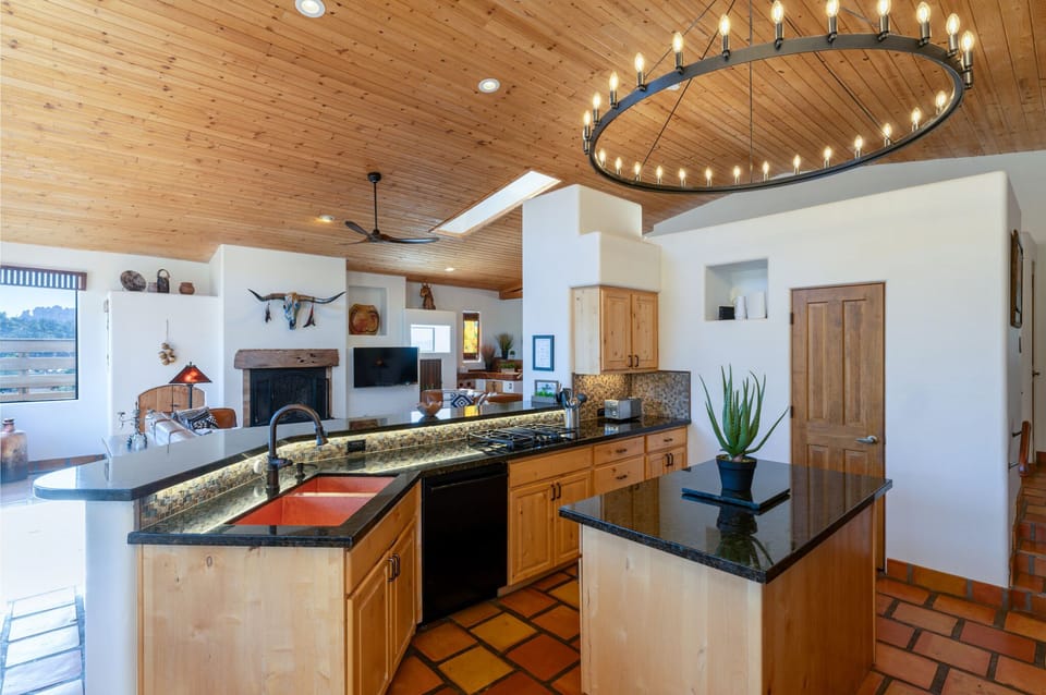Vaulted ceilings and sunshine: the heart of the home.