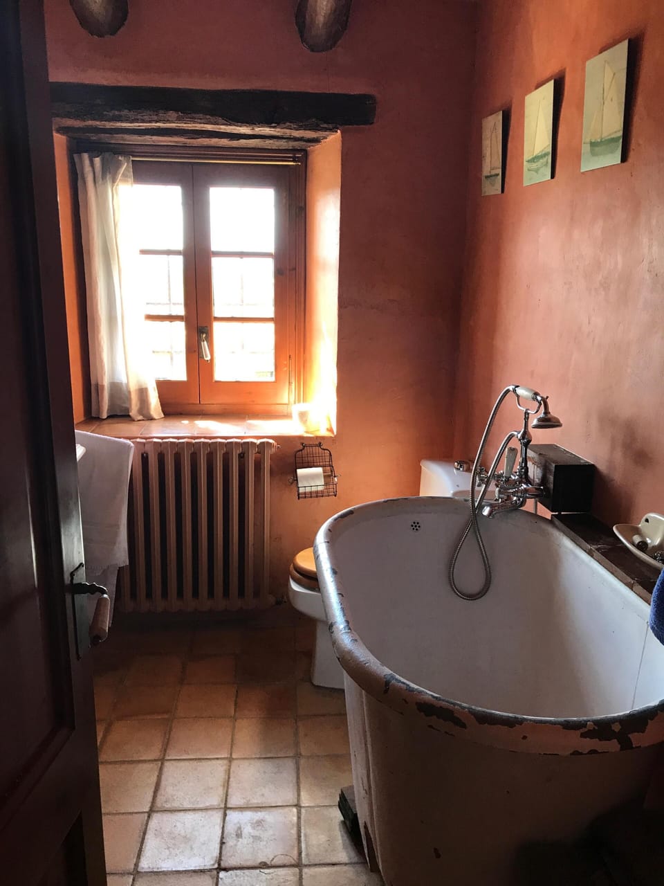 Small bathroom with shower next to the second double bedroom.