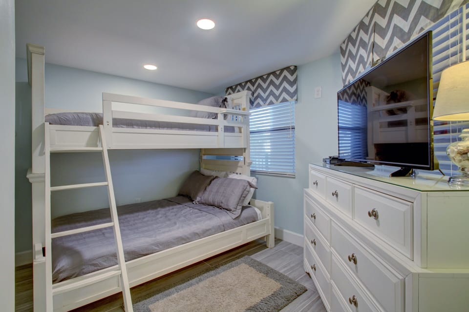 Guest bedroom. Twin over full. Large dresser and brand new T.V.