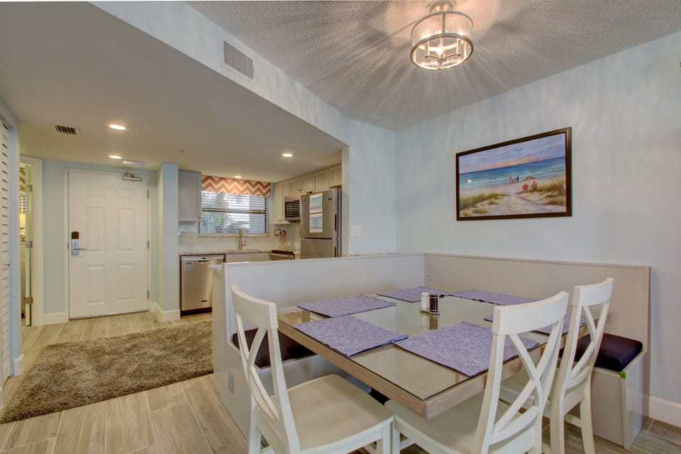 View of dining area from living area. New lighting as well.