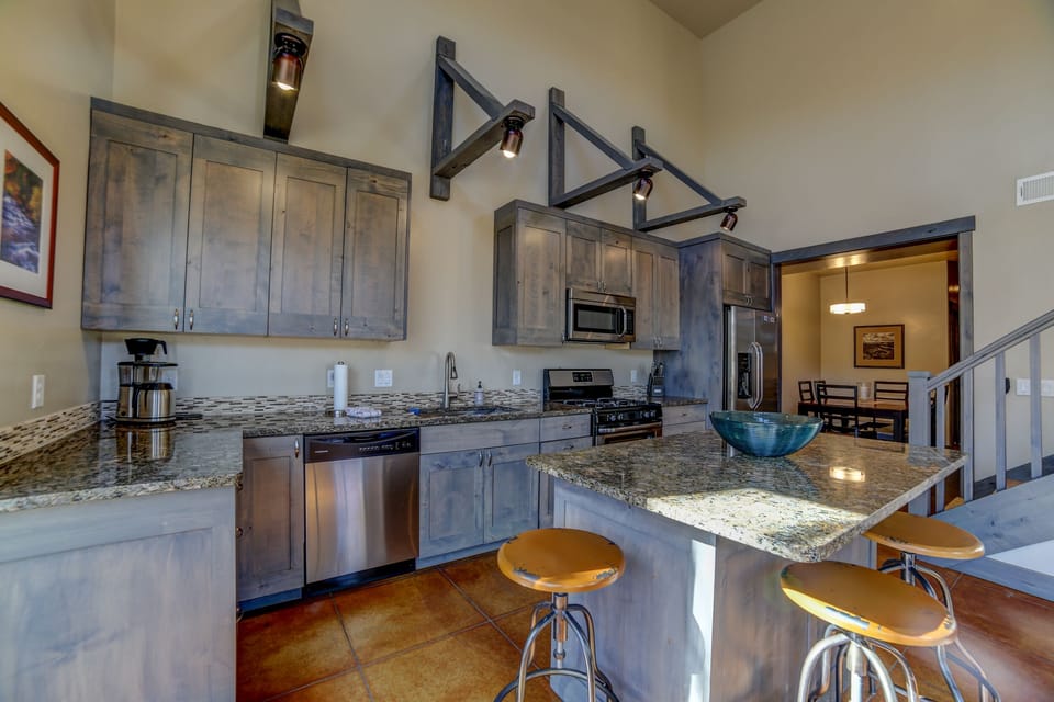 Kitchen with dining room in the background.