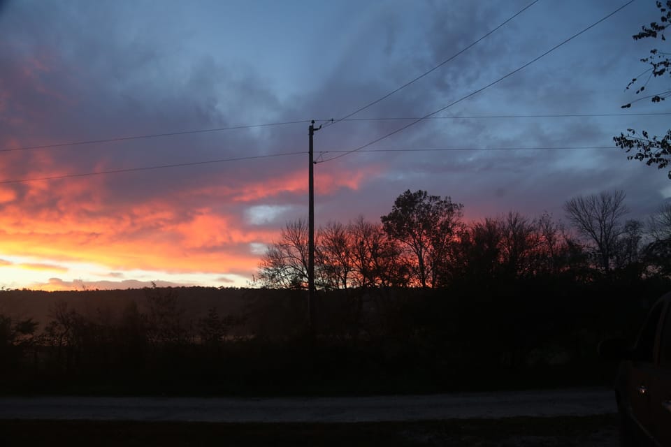 Enjoy a beautiful sunset in front of house - empty field