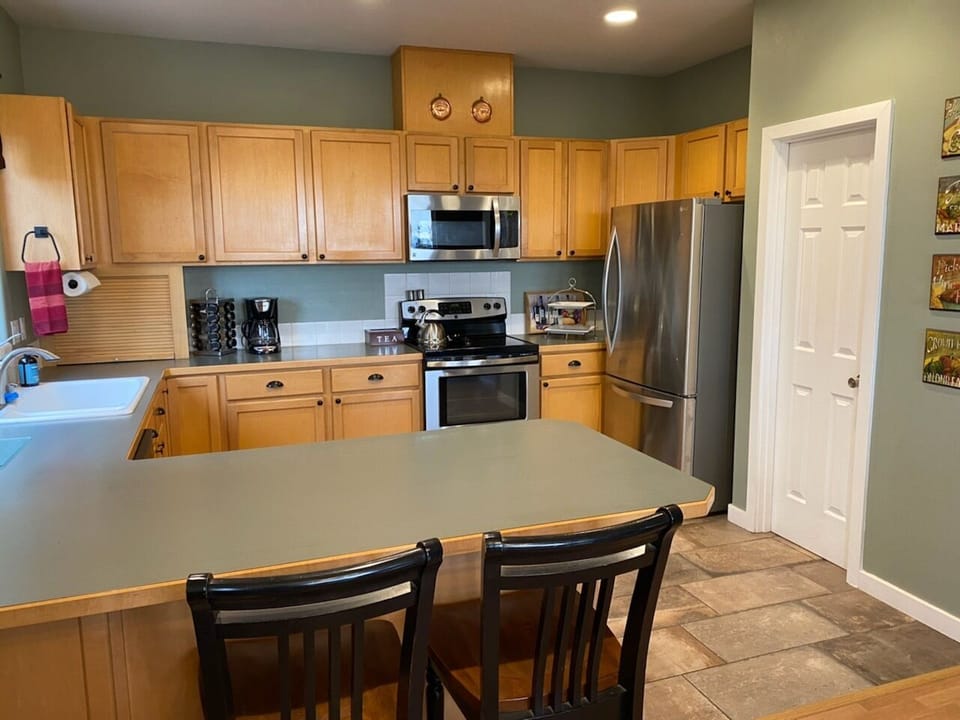 Kitchen with all stainless appliances