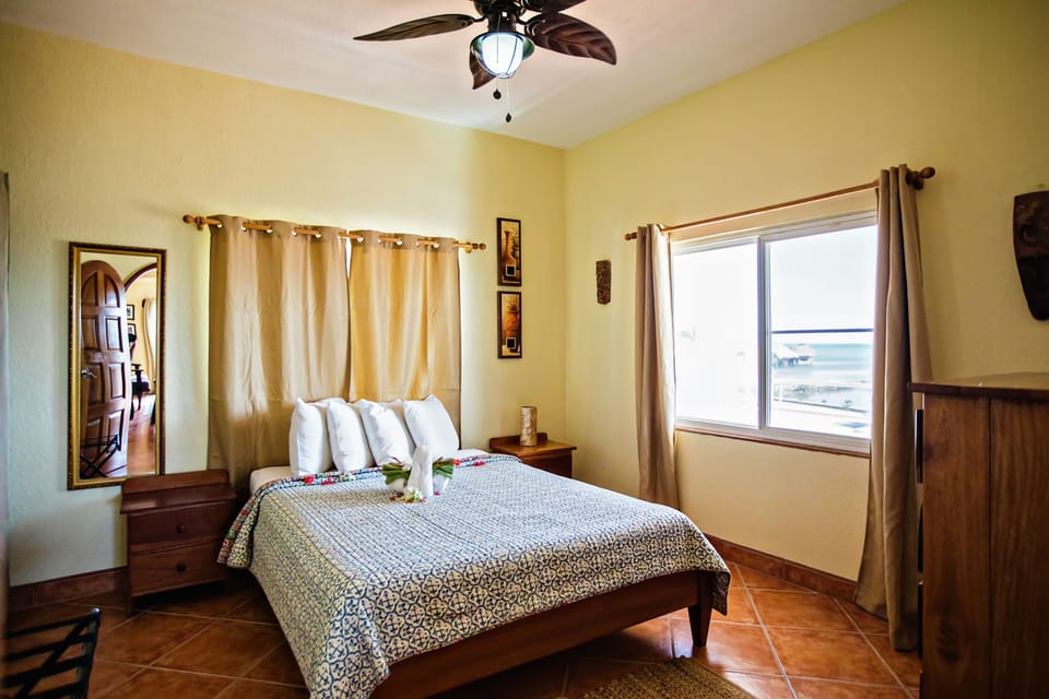Upstairs beachside bedroom - queen bed (no ensuite)