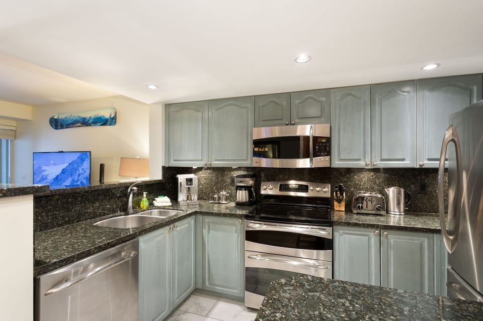 Beautifully renovated kitchen with new stainless GE Profile appliances