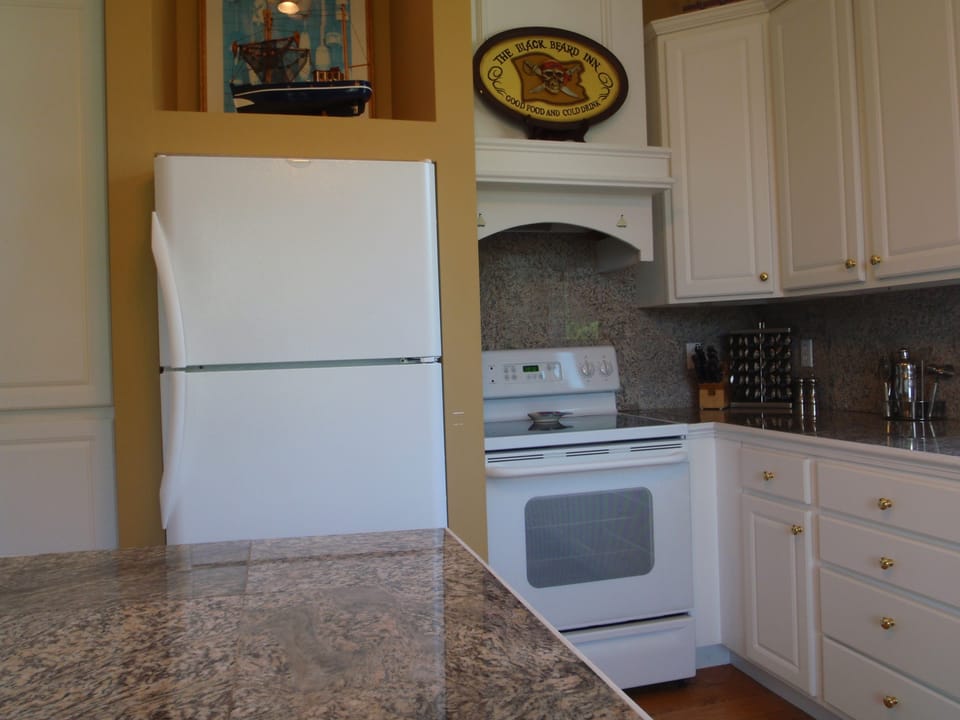 Refrigerator and range