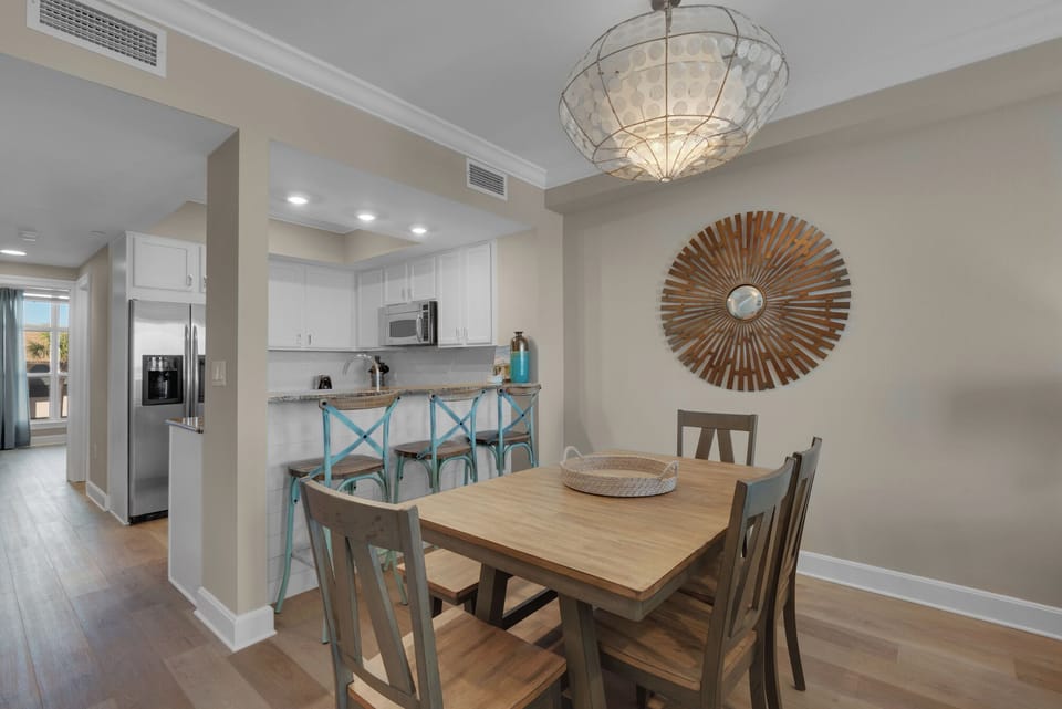 Seating area with Dining room table and kitchen bar area