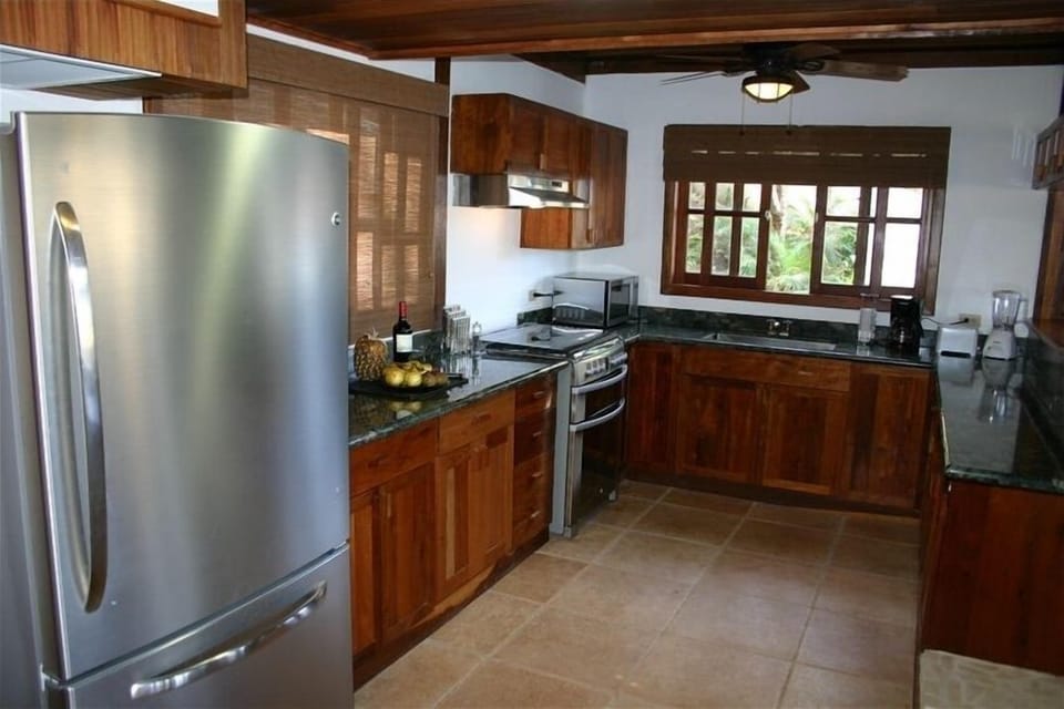 The kitchen on the main floor is open to the great room and brand new