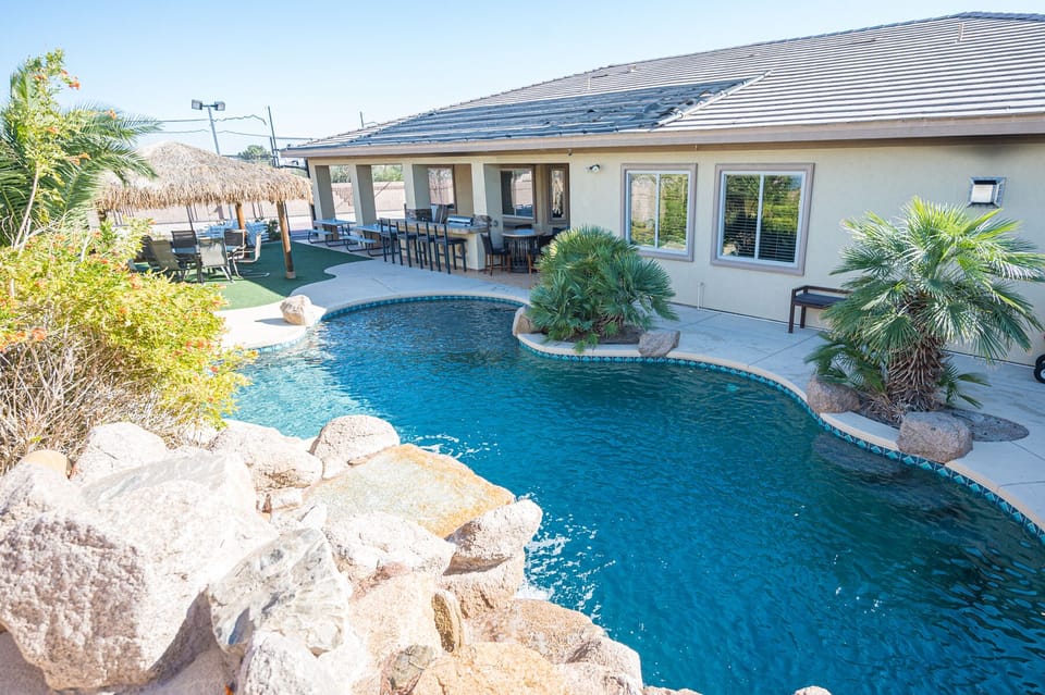 Lagoon Pool w/Waterfall/Grotto & Slide. Our Salt System uses less Chlorine. 