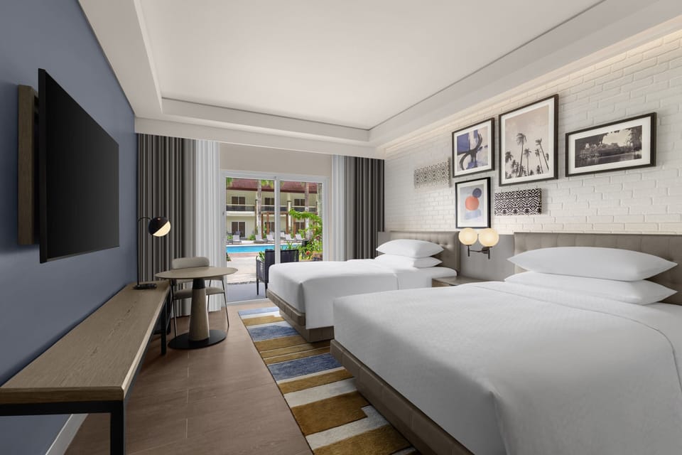 Premium bedding, down comforters, in-room safe, desk