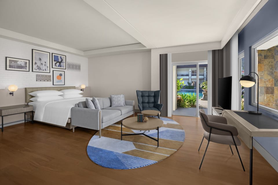 Premium bedding, down comforters, in-room safe, desk