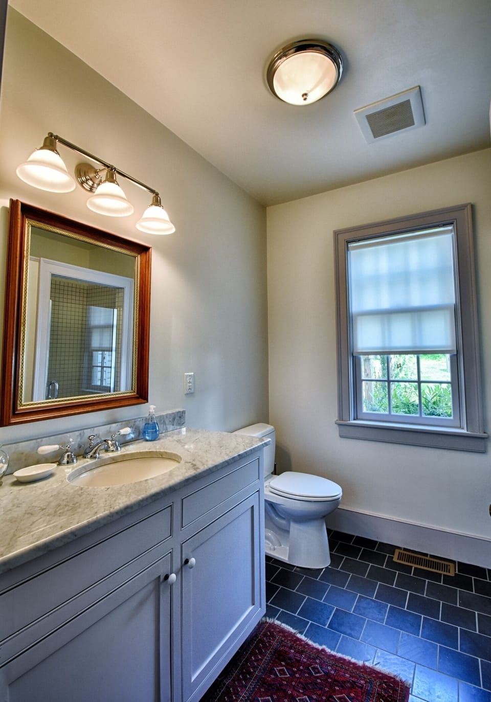 Adjacent to the ground-floor bedroom, this bathroom has a walk-in shower.