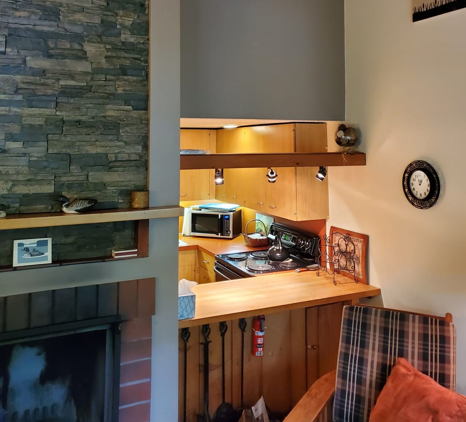 There is a fully stocked kitchen off the common area.