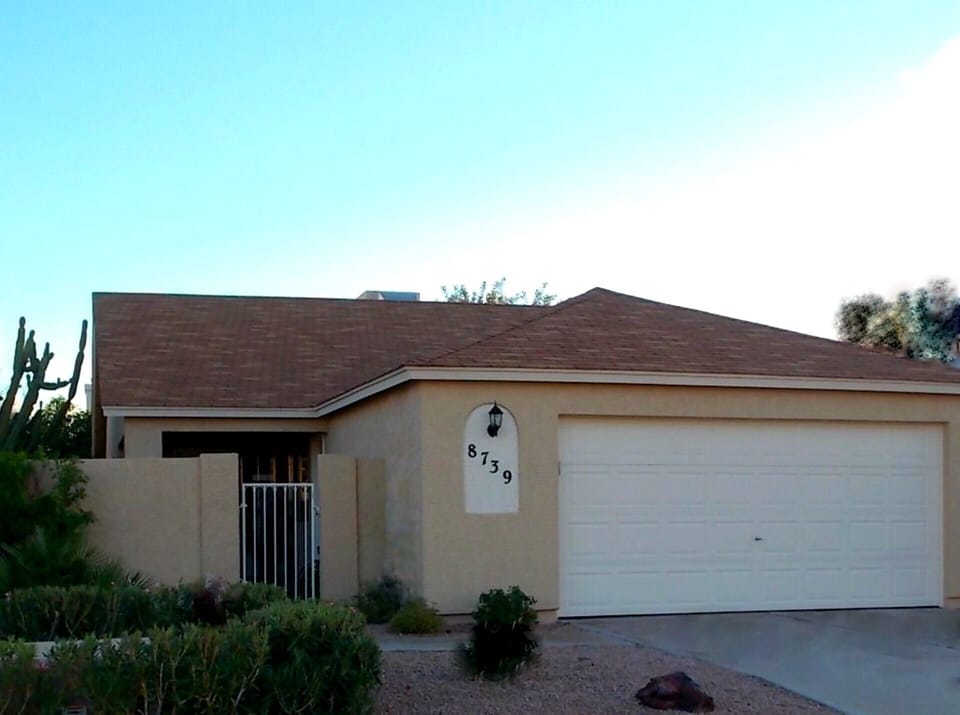 Single Family Home w/ 2 Car Garage and Very Private Fenced Yard.