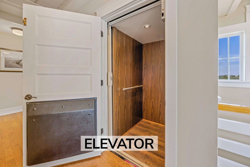 Surf or Sound Realty - 866 - Wa-Hoo Hattera- Elevator - Label