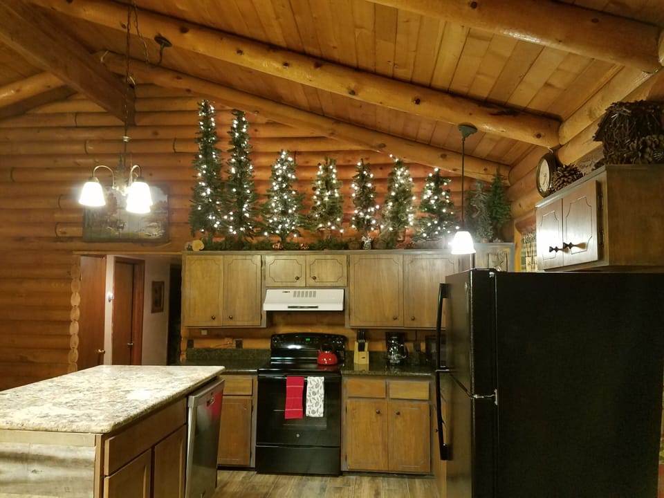 Kitchen the teapot is ready as is coffeemaker  Games in lower left cabinets.