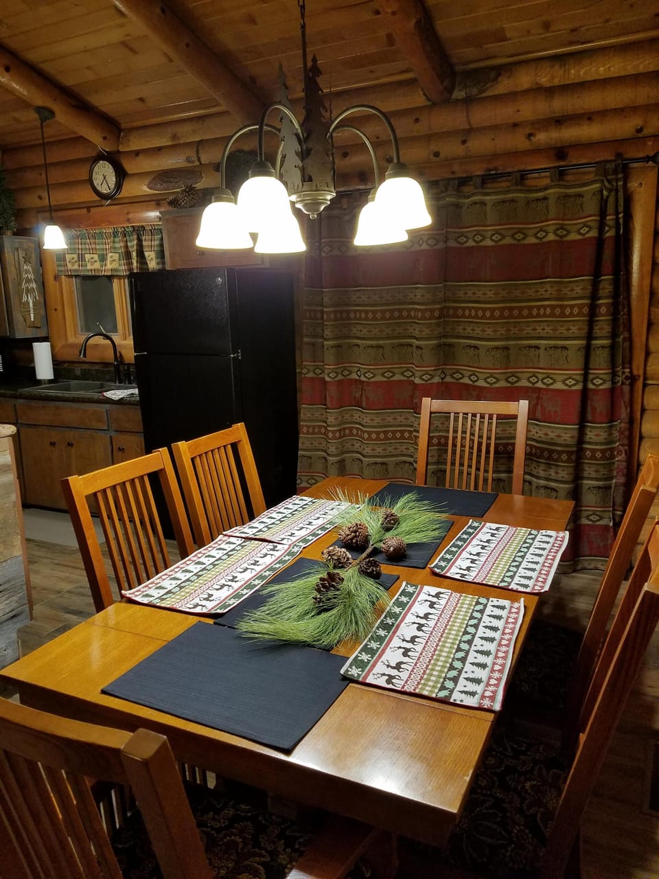 dining room
 seats six with a window and sliding glass doors to look at nature.