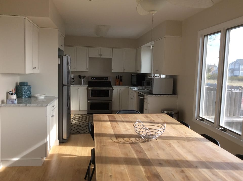 Top of the line kitchen, completed with R.H.S. Table. Sits 6- 8