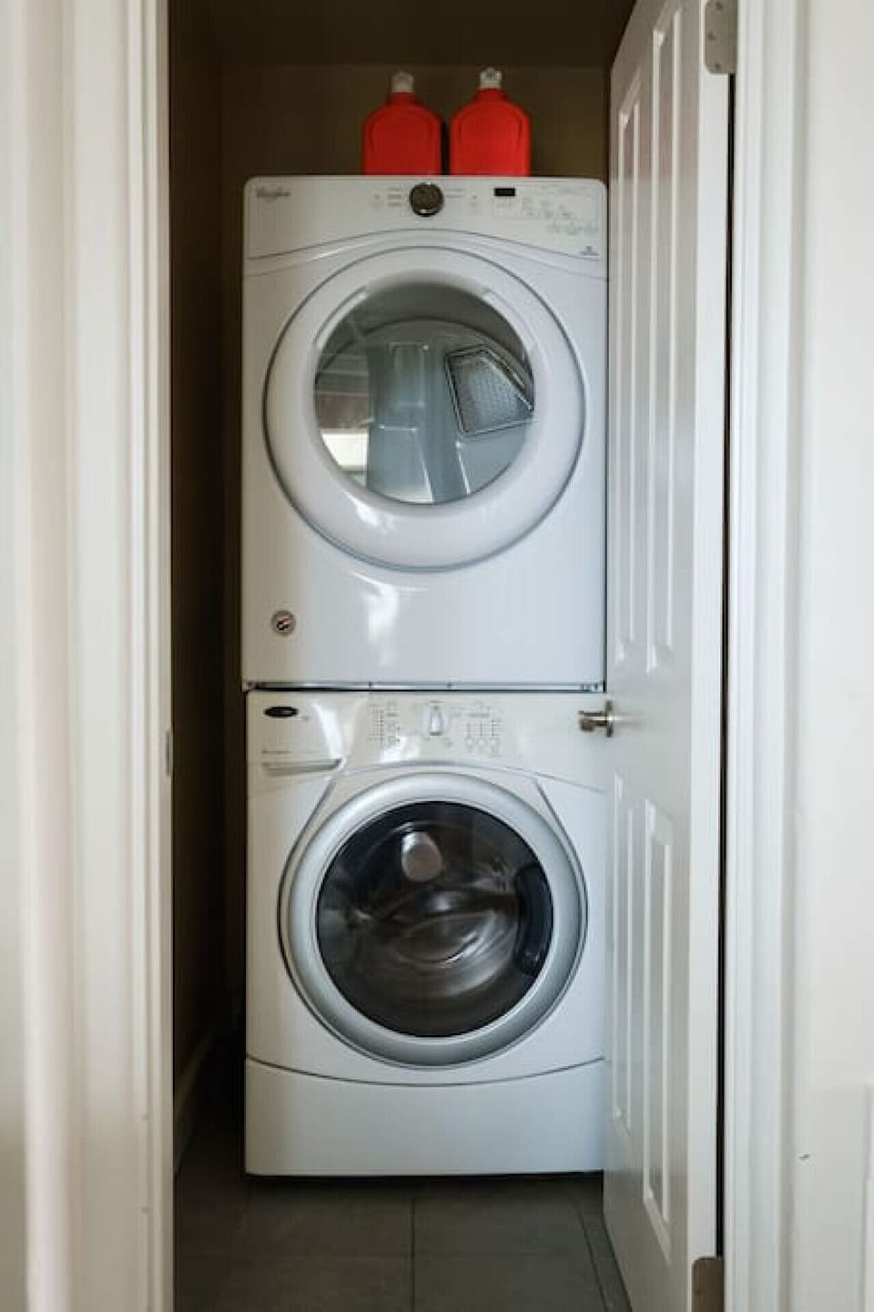 Washer and dryer are off the living room area. Detergent is provided.
