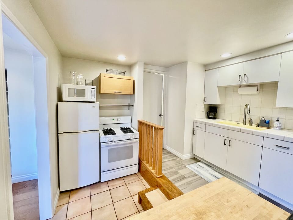 The kitchen cabinets are stocked with everything needed to cook and serve a fabulous meal.
