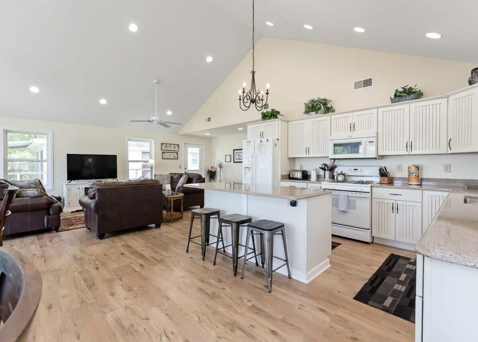 Kitchen area of the Sunset Beach House great room with island seating