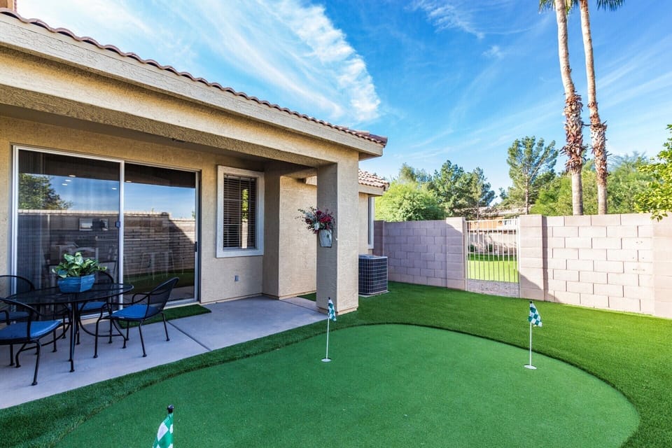 Putting green and patio furniture