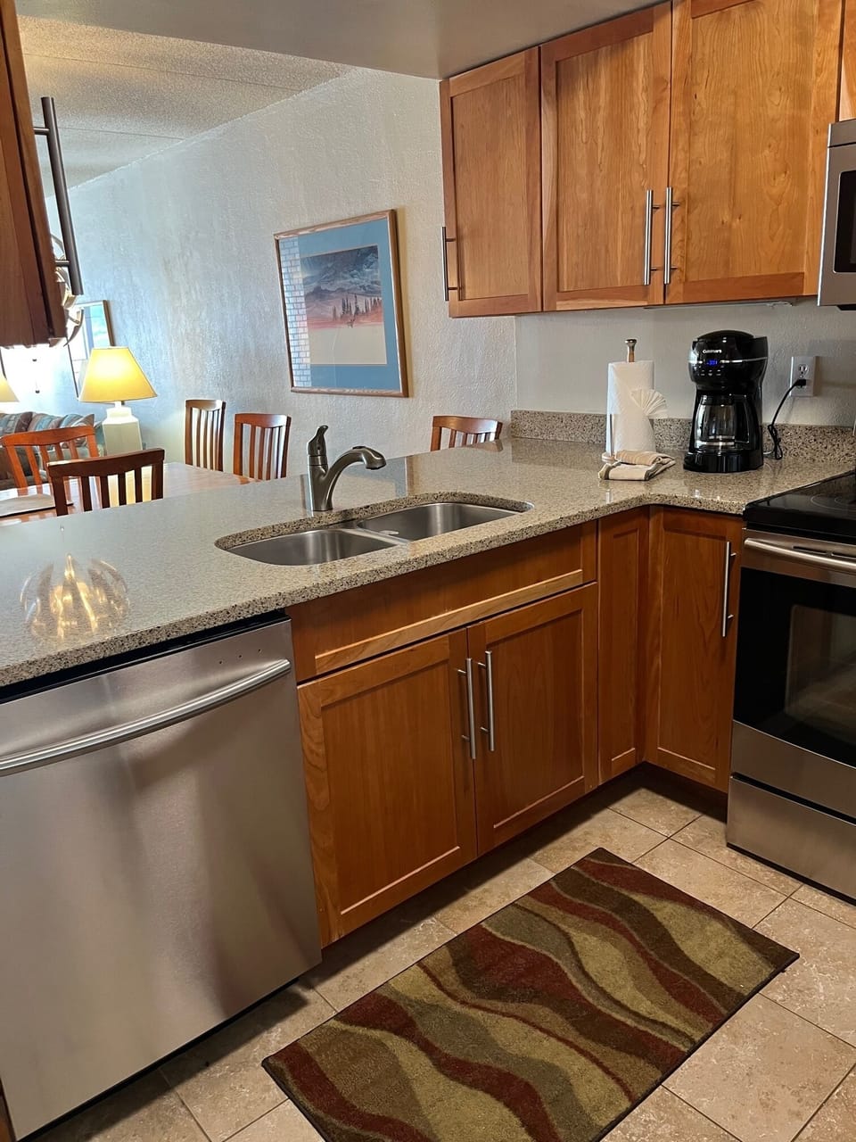 Kitchen showing dining table over the counter