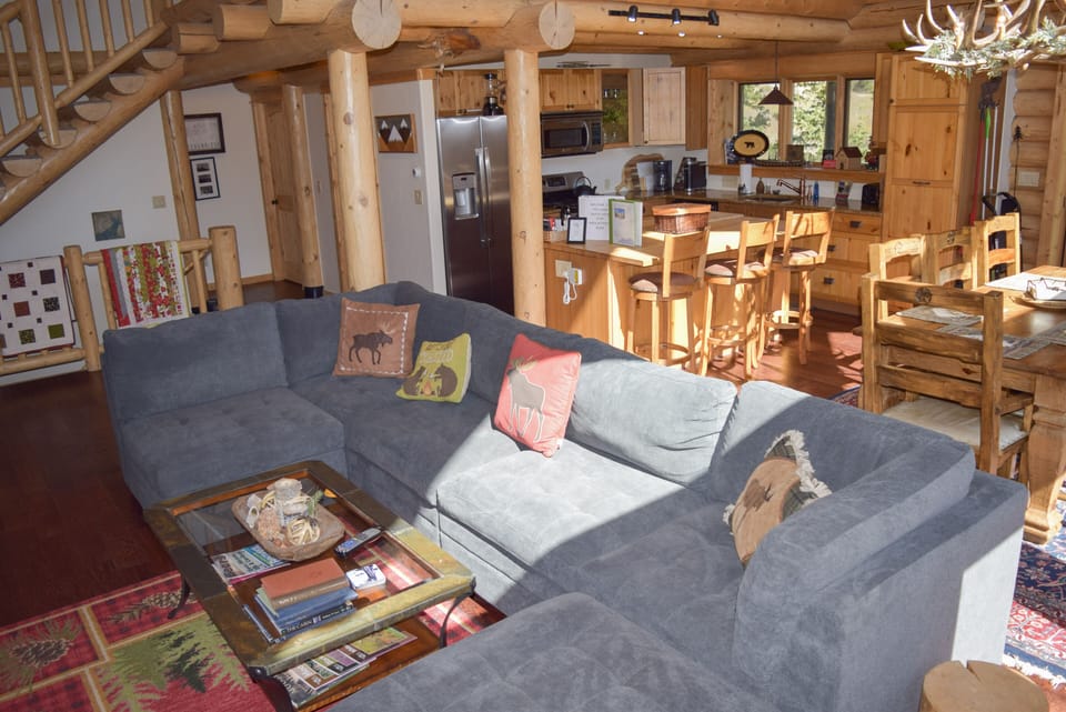 Another view of the great room that has a brand new comfy couch.