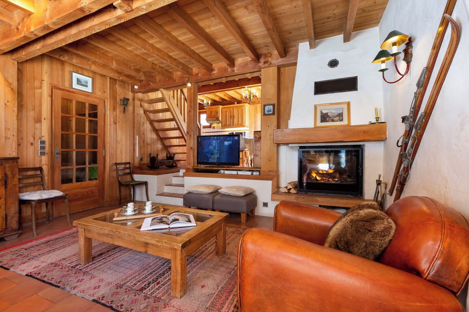 Spacious living room with a log fire