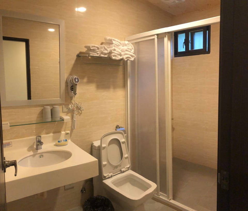 Quadruple Room, 2 Double Beds, Non Smoking, Ocean View | Bathroom | Shower, free toiletries, hair dryer, towels
