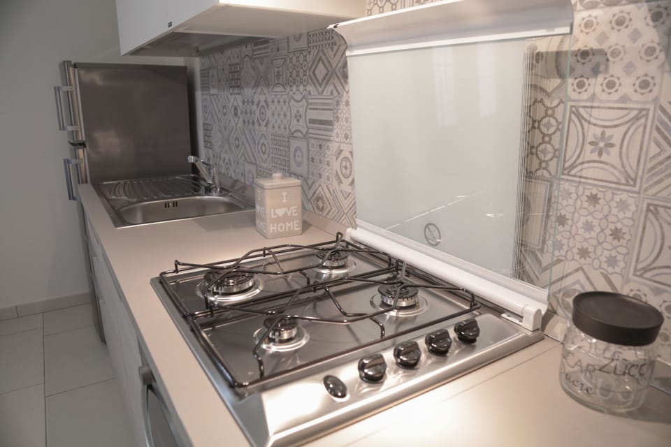Apartment, 1 Bedroom | Private kitchen | Fridge, oven, stovetop, electric kettle
