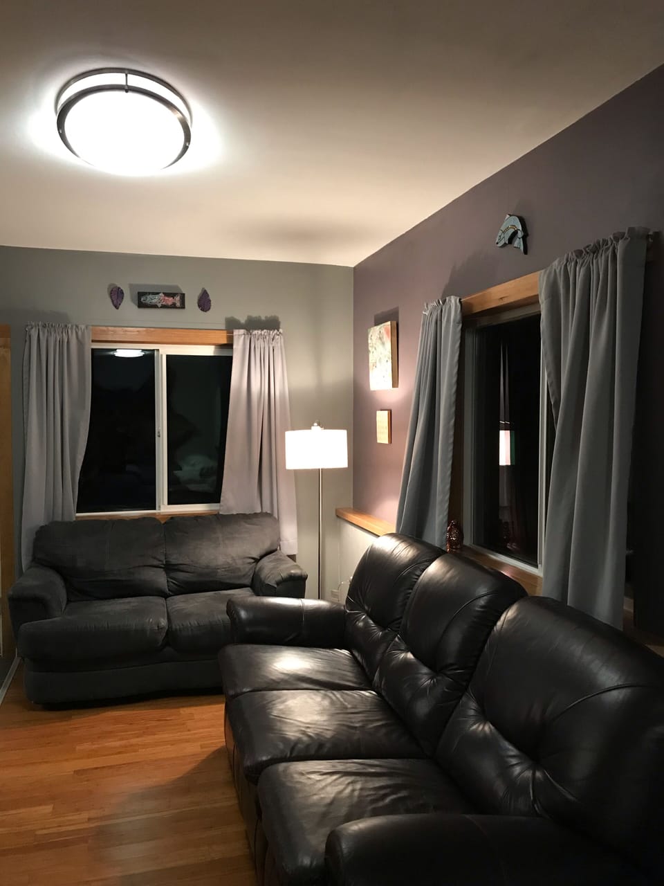 Lovely bamboo flooring and cozy leather couch 