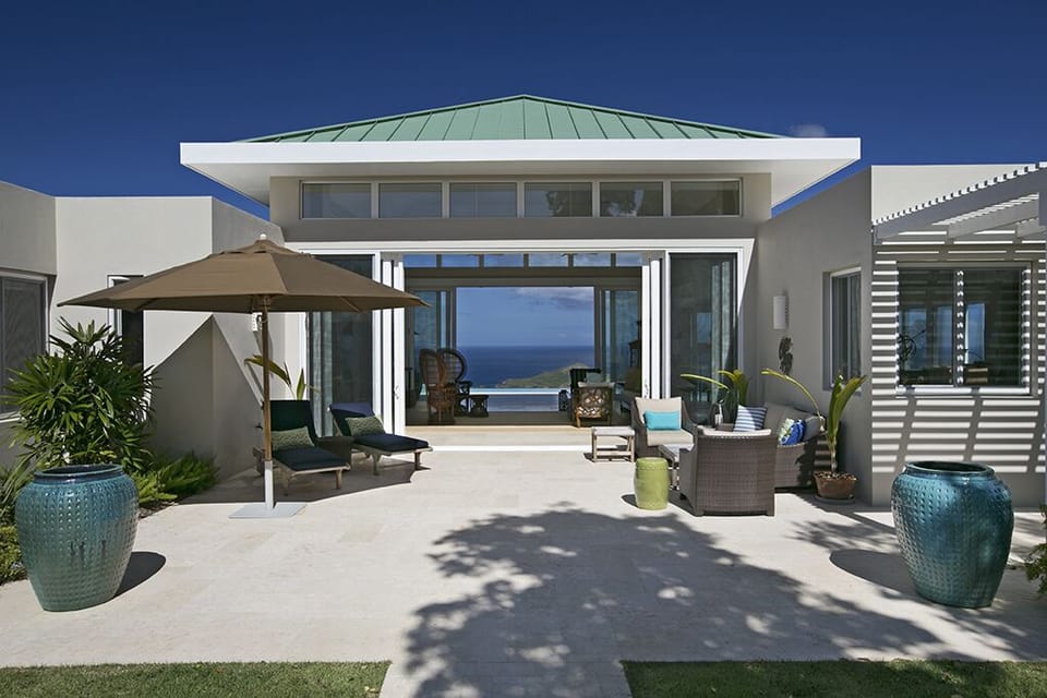 Enter through the spacious, well-furnished garden terrace...
