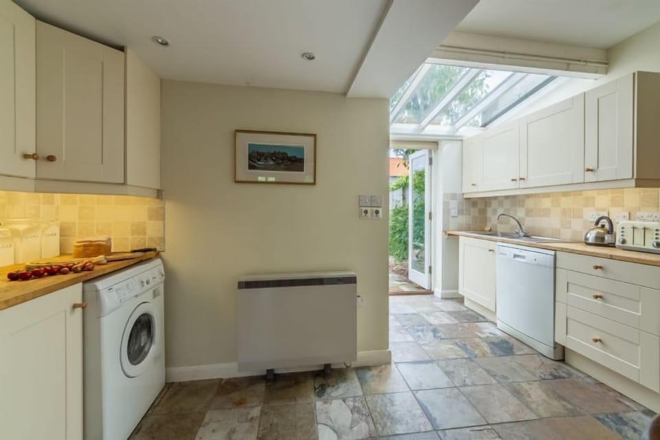 Ground floor: The Kitchen has partially glazed roof