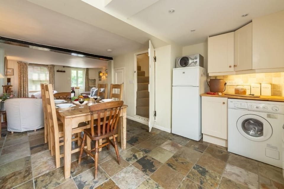 Ground floor: Open-plan living area, and winder stairs to the first floor